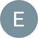 E J